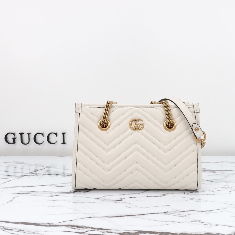 G*u*i shopping bags